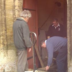 Preparing to move the bell inside the church