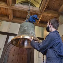 Raising the bell to the ringing platform. Photo: Nigel Francis