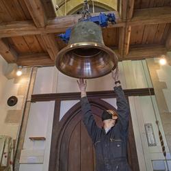 Raising the bell to the ringing platform. Photo: Nigel Francis