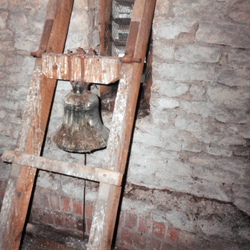 Bell located in the village hall